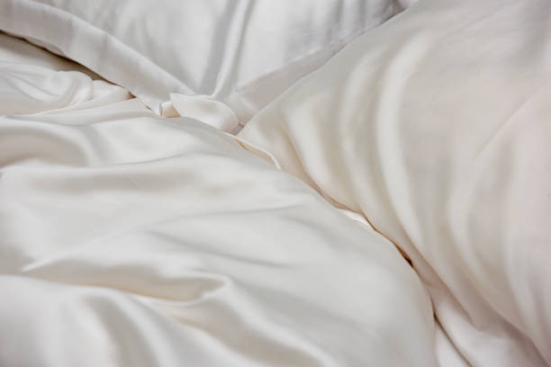Beautiful bedding on a large bed in a king size bedroom